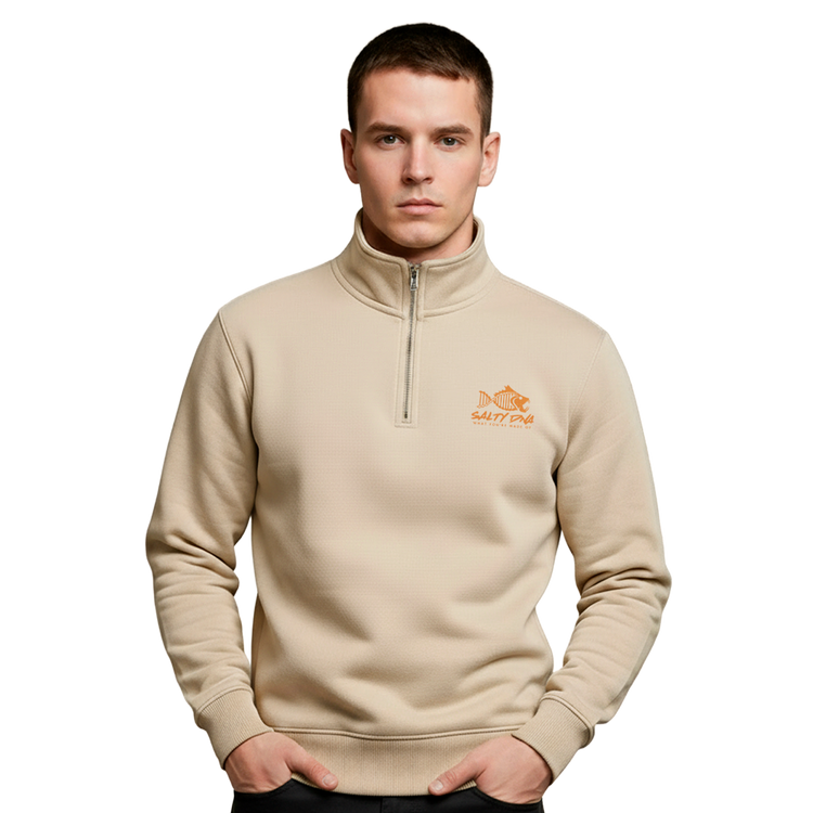 Man wearing an ivory Salty DNA quarter-zip sweatshirt