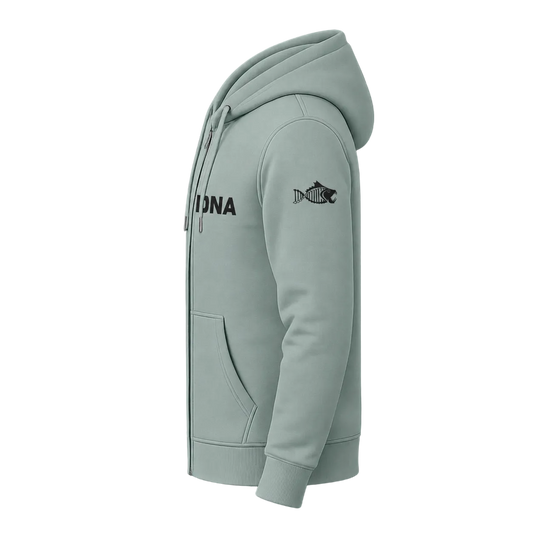 A light sage green zip-up hoodie shown from the side profile against a solid black background. The hoodie features a black fish graphic on the upper left chest and the word 'ONNA' printed in black on the upper right chest.