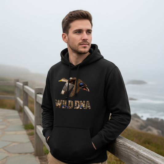 Model wearing the Wild DNA Black Duck Hoodie outdoors